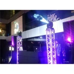 2M totem truss with moving head lights on event site