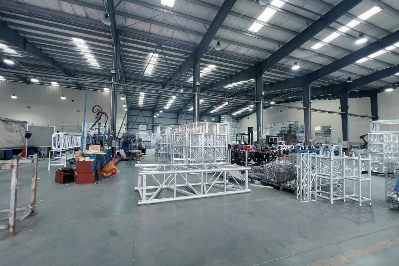 Aluminum truss system neatly arranged in production workshop after welding fabrication for stage truss and event structure applications