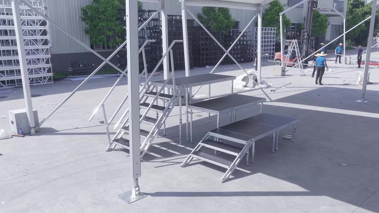 Portable outdoor stage installation with modular stairs