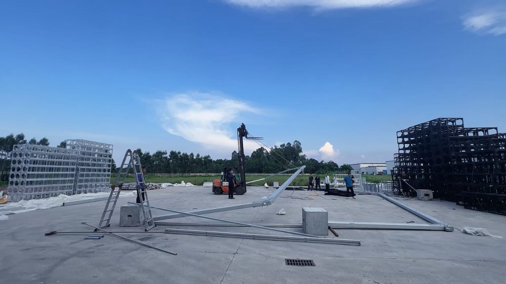 Outdoor event tent ground layout before raising main columns